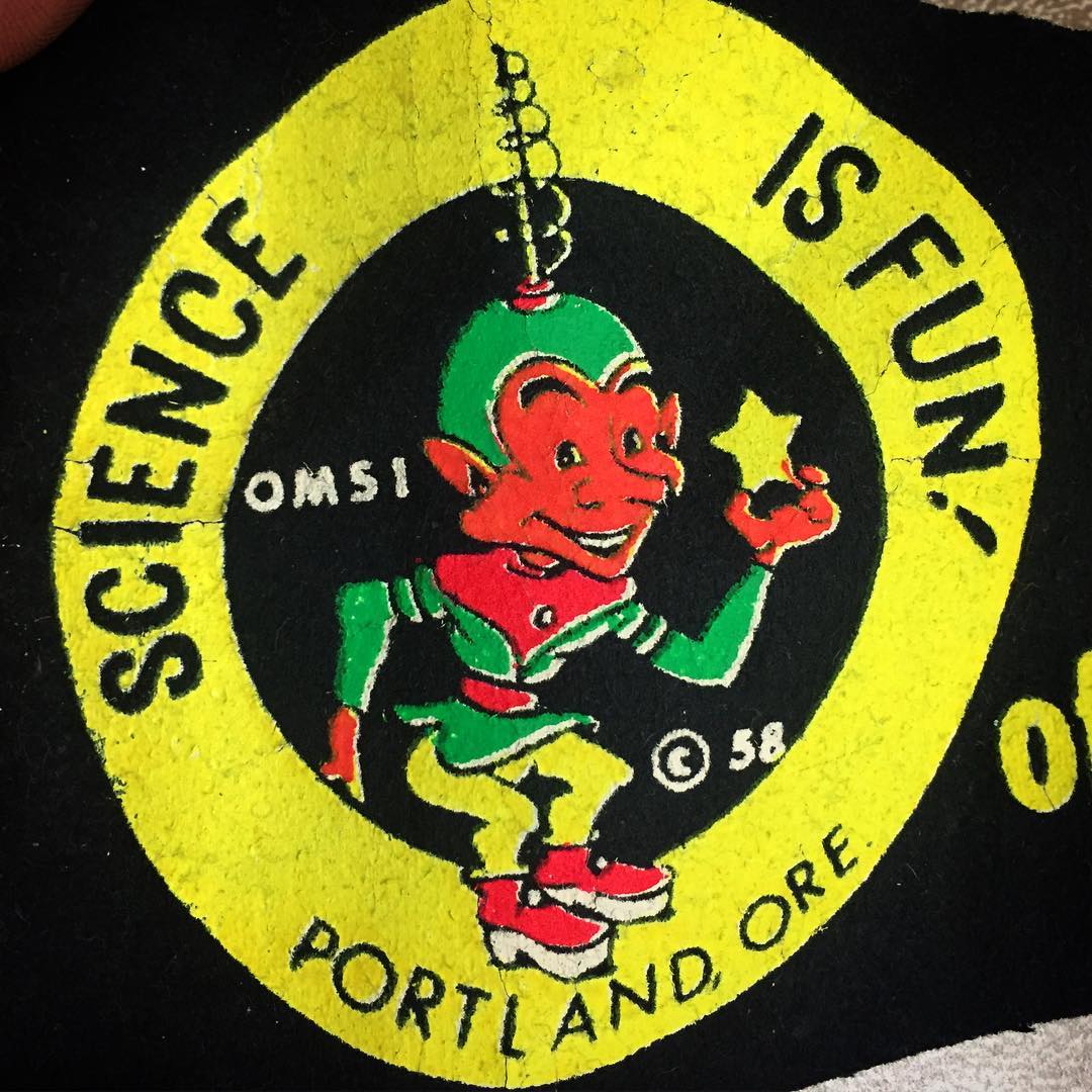 Vintage OMSI Banner Character